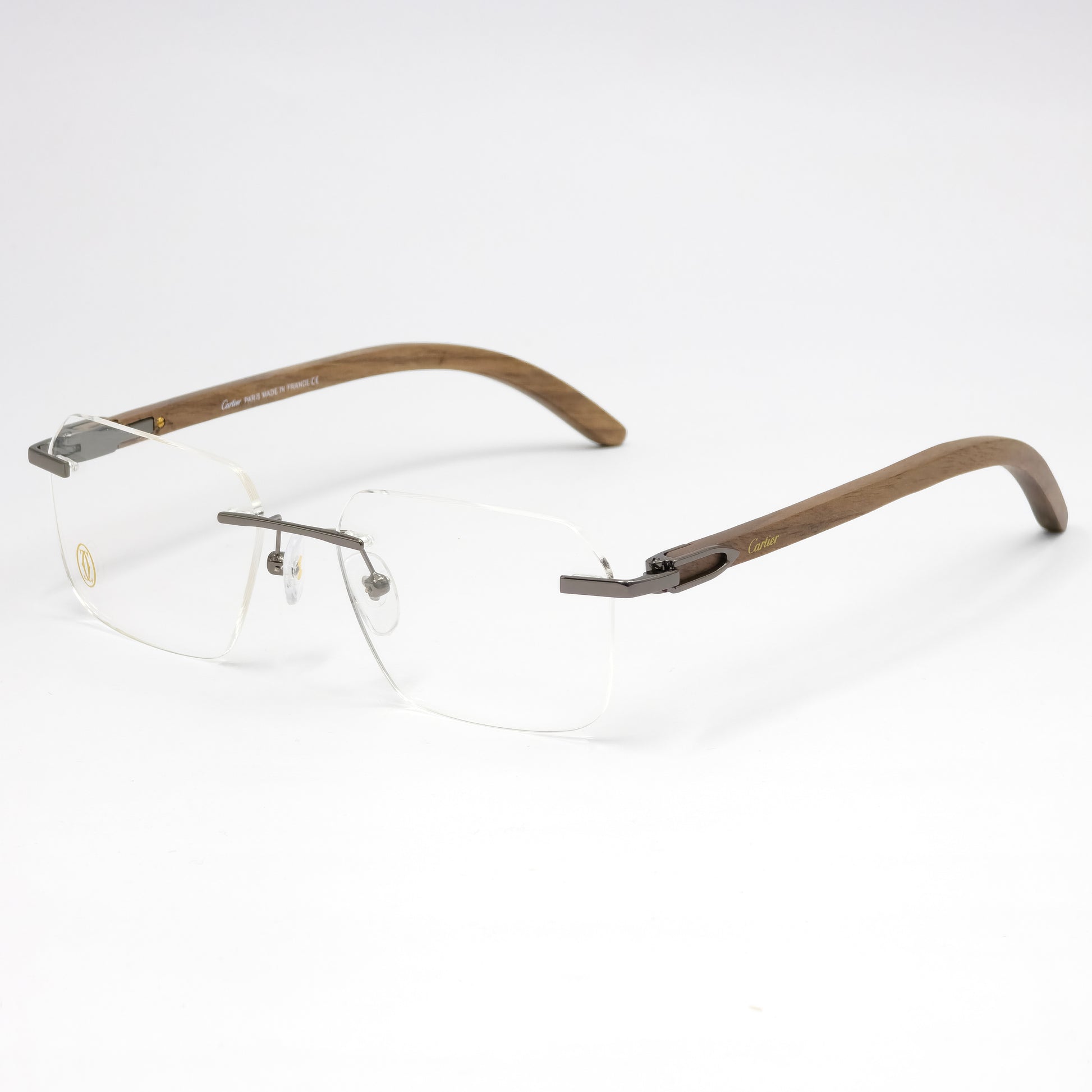 Brown rimless eyeglasses on a white background