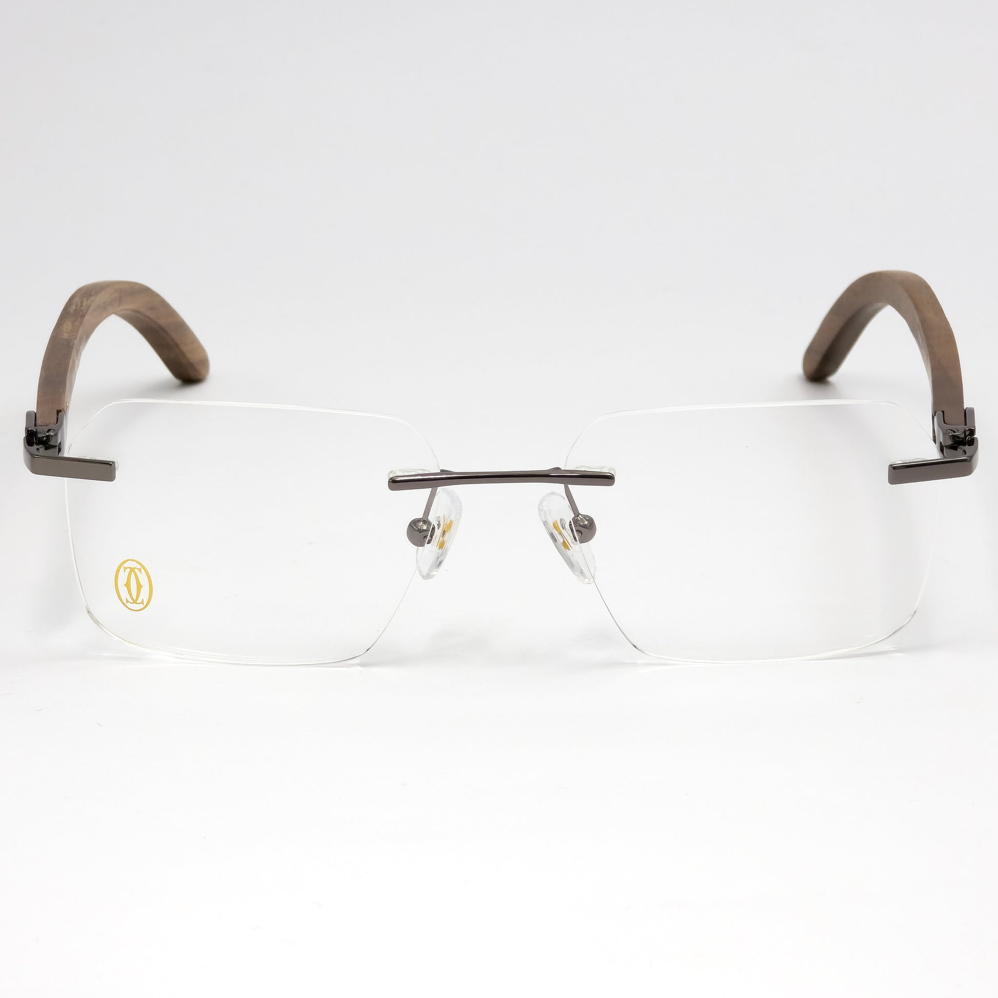 Eyeglasses with brown and gold frame on a white background