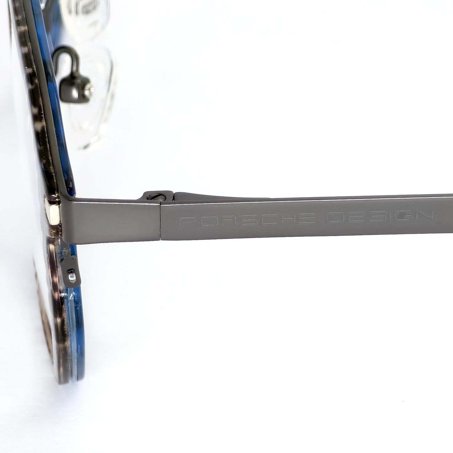 Close-up of a Porsche Design eyeglass frame on a white background