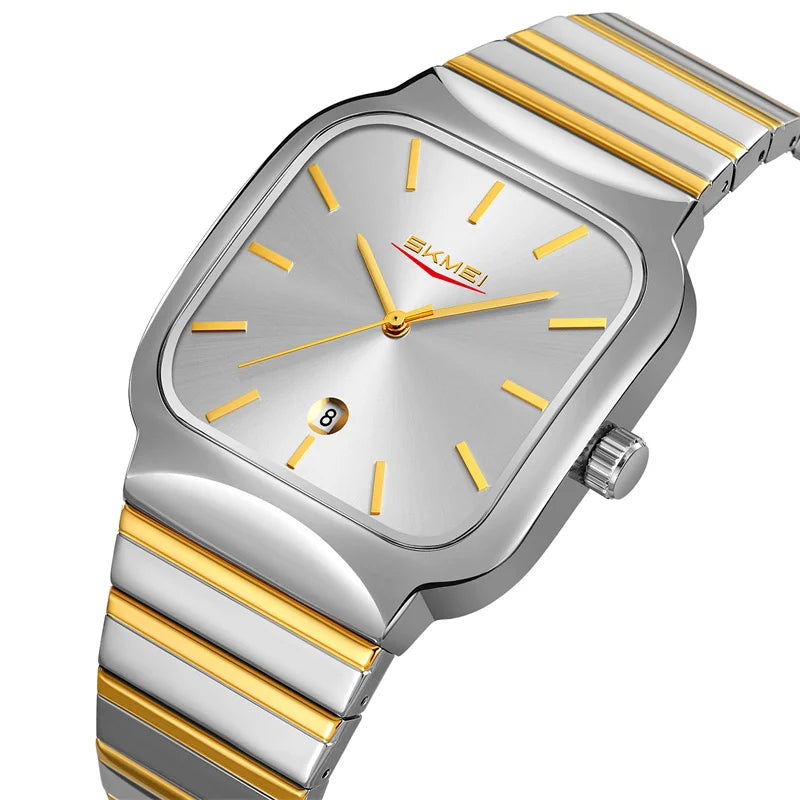 Silver and gold watch with a white background