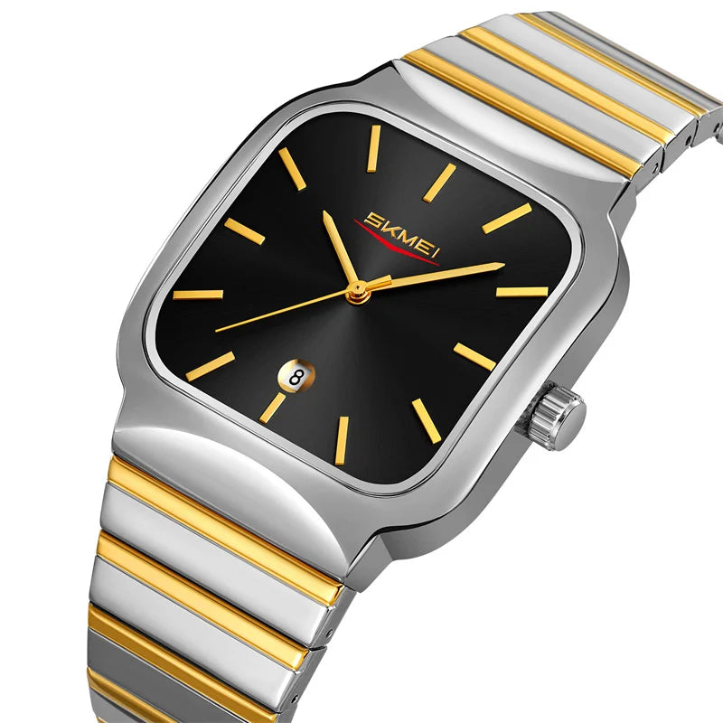 Wristwatch with gold and silver band on a white background