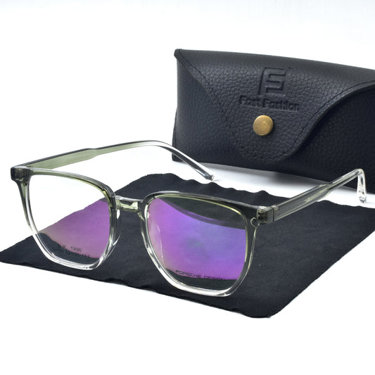 A pair of square-shaped, full frame optic eyewear with a purple tinted lens, placed on top of a black case with the initial 'F' logo visible on the leather.