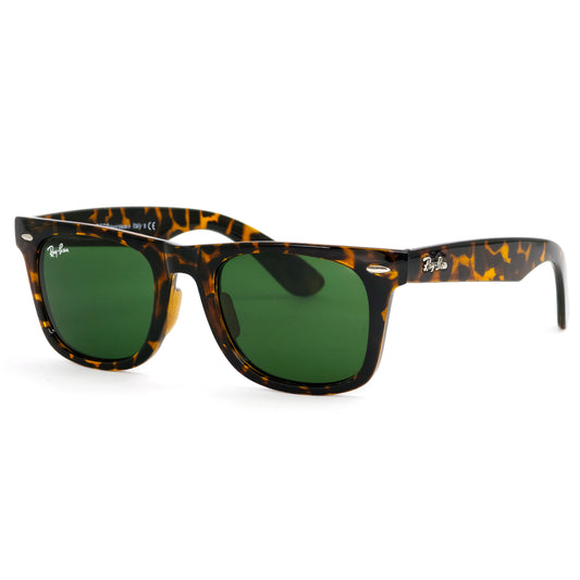 Sunglasses with tortoiseshell frame and green lenses on a white background
