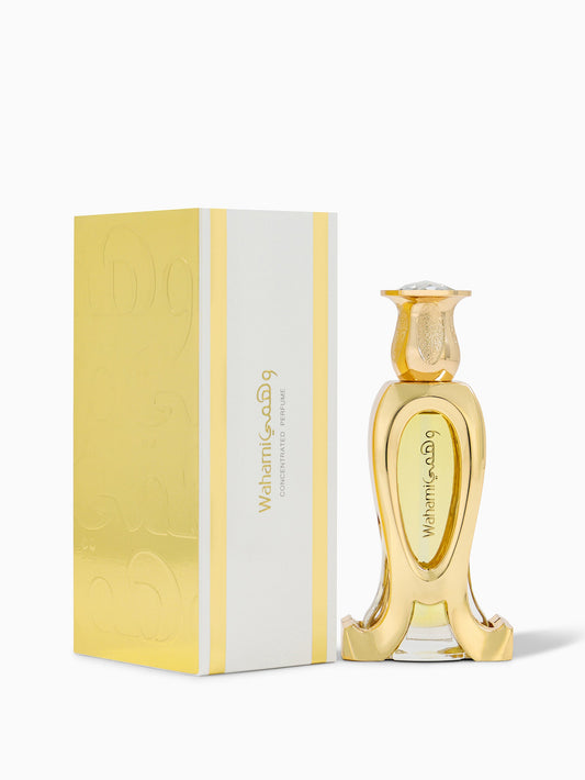 Gold perfume bottle and packaging with 'Wahsmi' branding on a white background