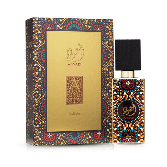 Perfume bottle and packaging with intricate designs on a white background