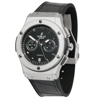 Hublot watch with black face and leather strap on a white background
