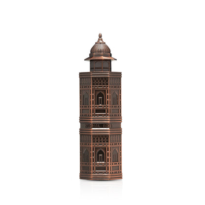 Bronze-colored decorative tower model on a white background
