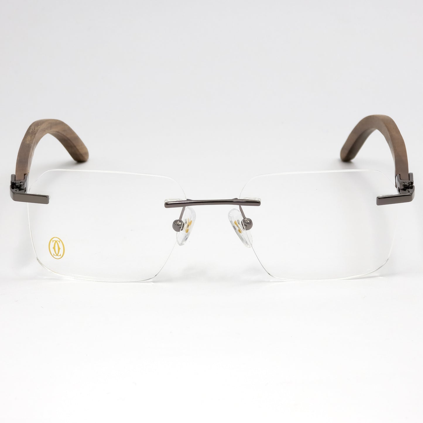 Eyeglasses with brown and gold frame on a white background