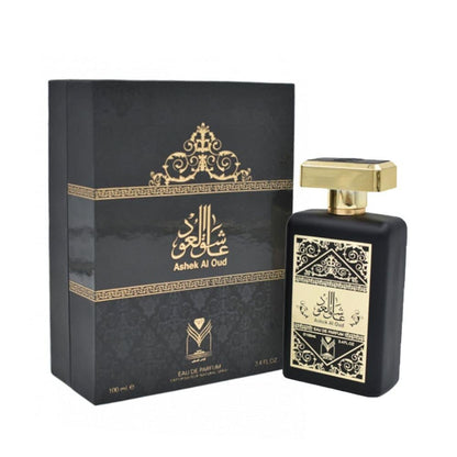 Black and gold Ashak Al Oud perfume bottle and packaging on a white background