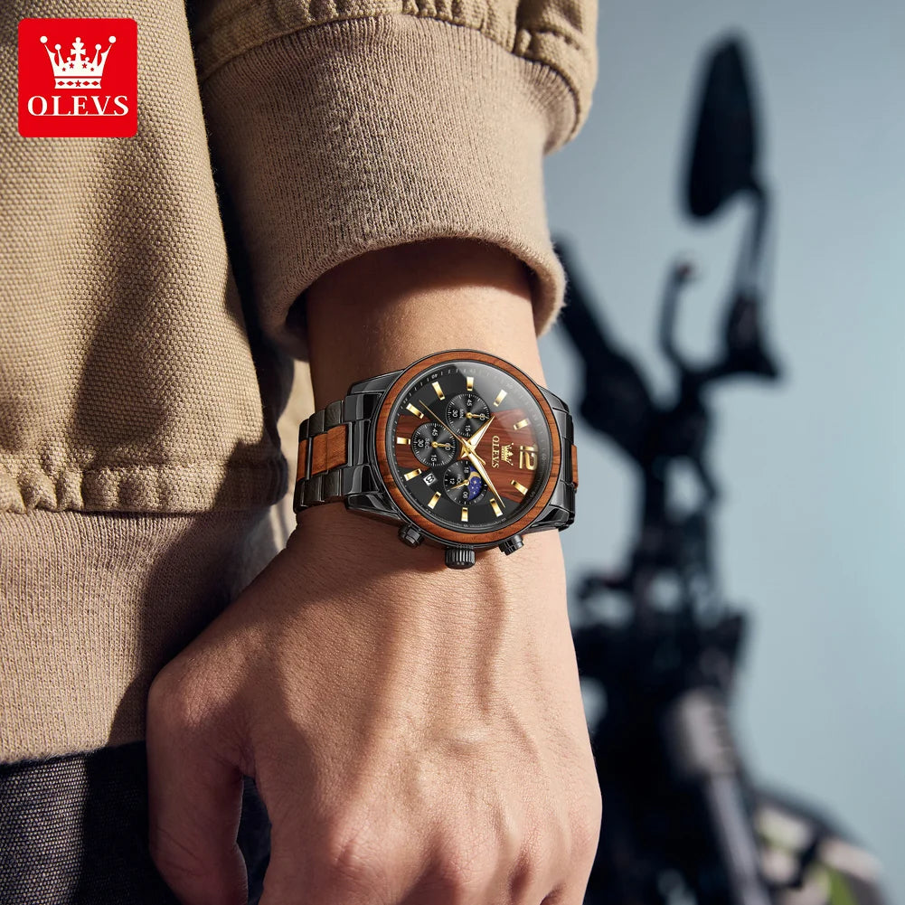 Person wearing a watch with OLEVS branding, standing against a blurred background.