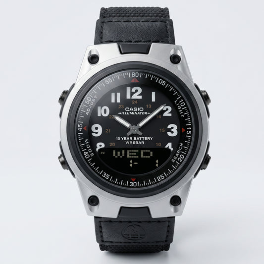 Casio watch with black strap on a light gray background
