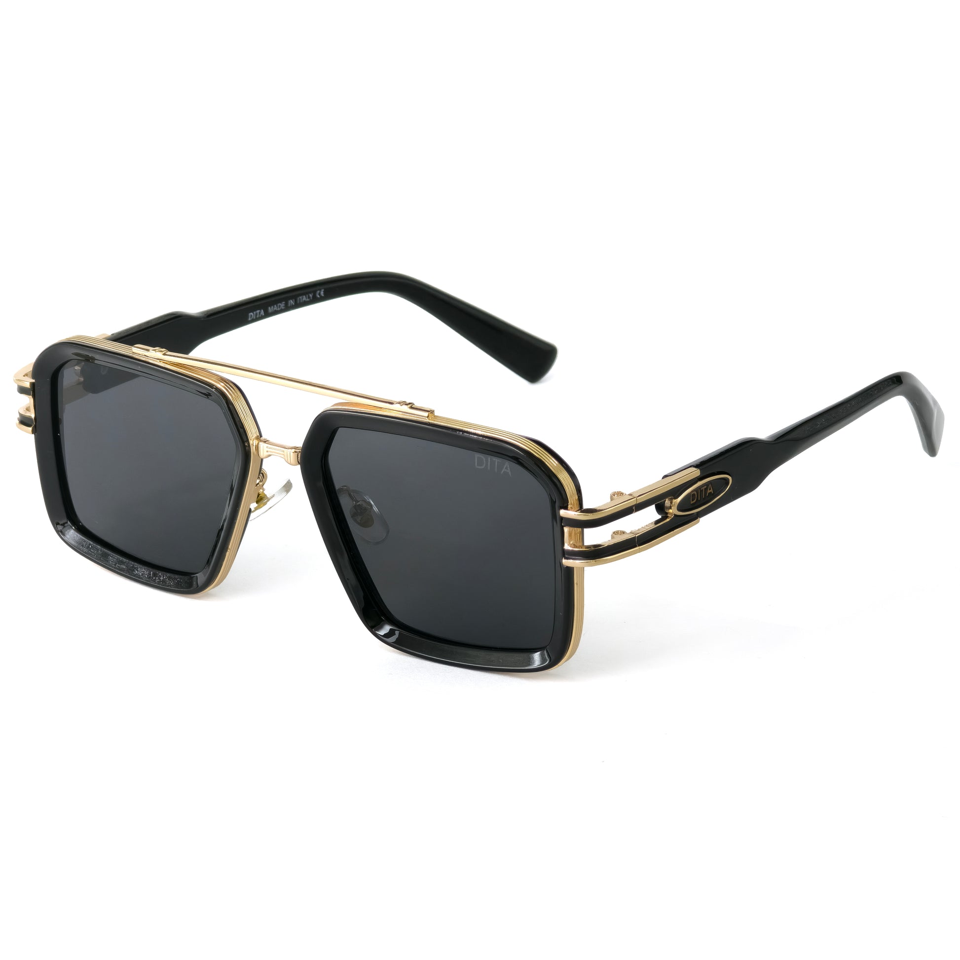Sunglasses with gold frame and black lenses on a white background