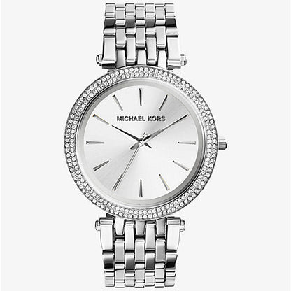 Silver watch with a detailed face on a white background