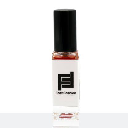 Small bottle with a black cap and white label featuring 'Fast Fashion' logo on a white background