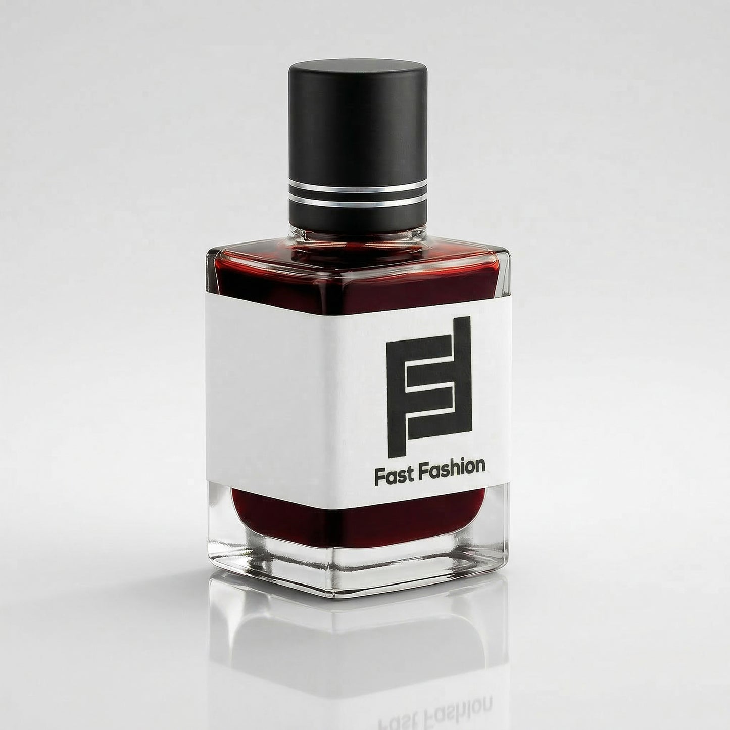 Perfume bottle with black and white label on a light gray background