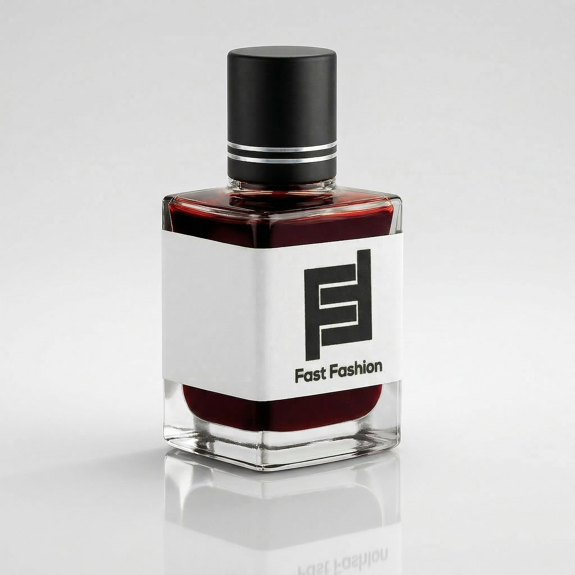 Perfume bottle with black and white label on a light gray background