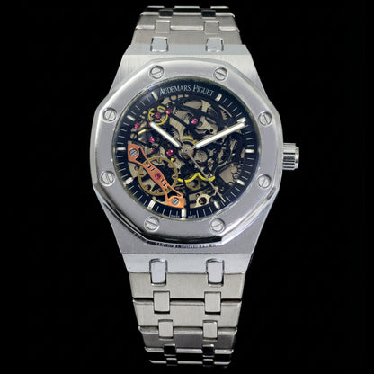 Silver watch with a detailed face on a black background