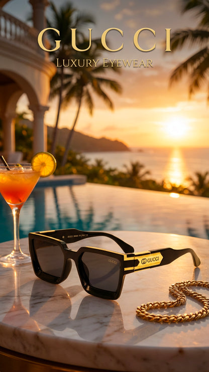 Black and gold Gucci sunglasses on a white background