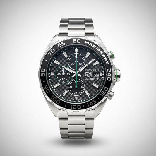Silver watch with black dial on a light gray background